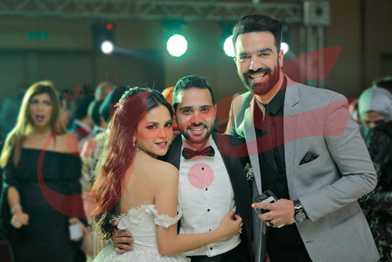 محمد-سراج-مع-العروسين