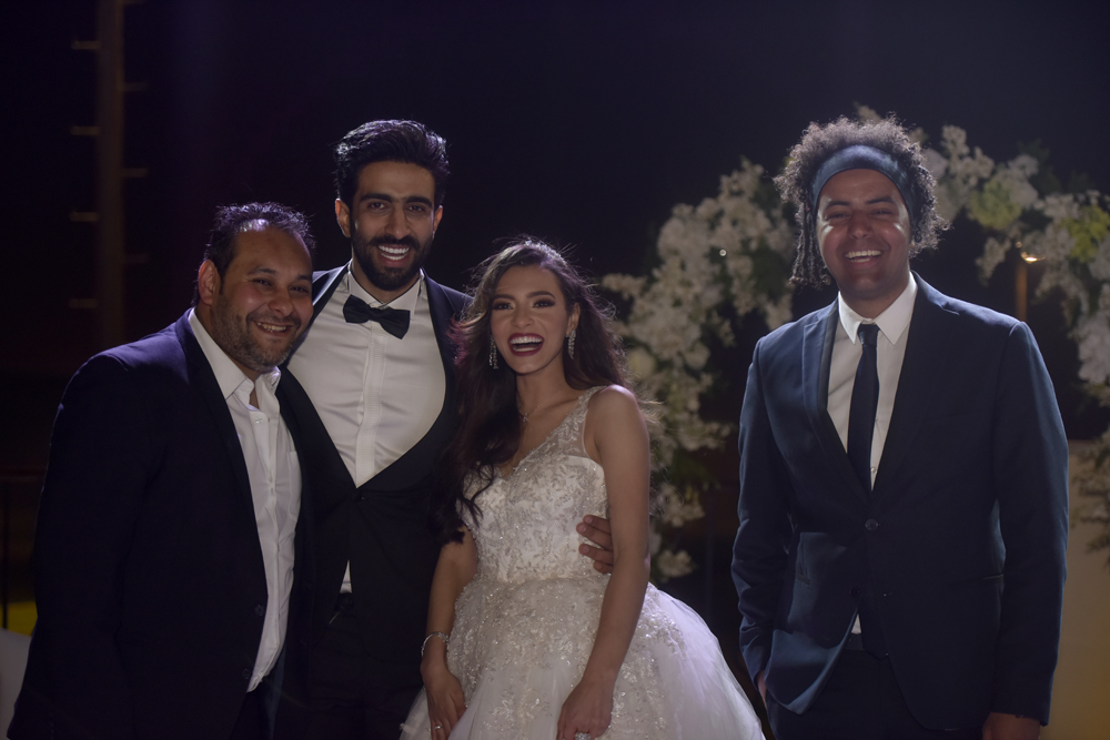 احمد كوتي ومحمد منصور مع العروسين