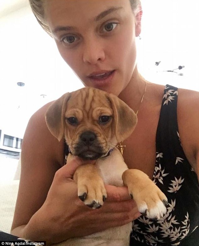 40D6671F00000578-0-Adopted_a_dog_Nina_Agdal_shared_this_selfie_to_her_Instagram_Fri-m-9_1495837997849