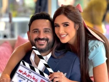 ياسمين عبد العزيز وأكرم حسنى