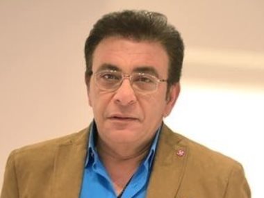 الإعلامي عاطف كامل