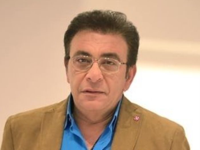 الإعلامي عاطف كامل